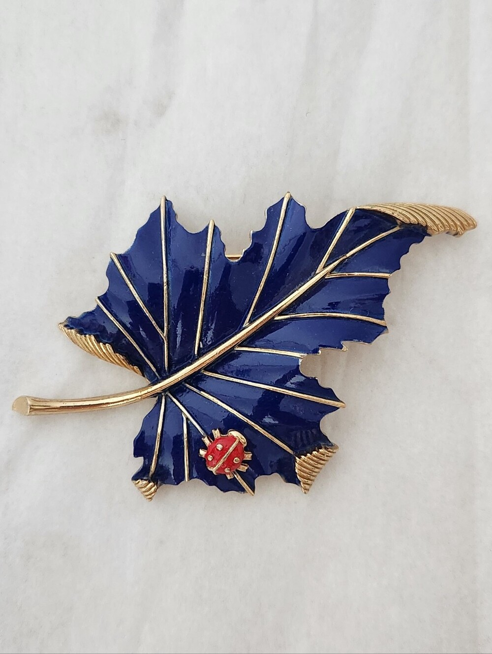 Vintage Mid-century Trifari Blue and Gold Leaf Brooch with Red Ladybug